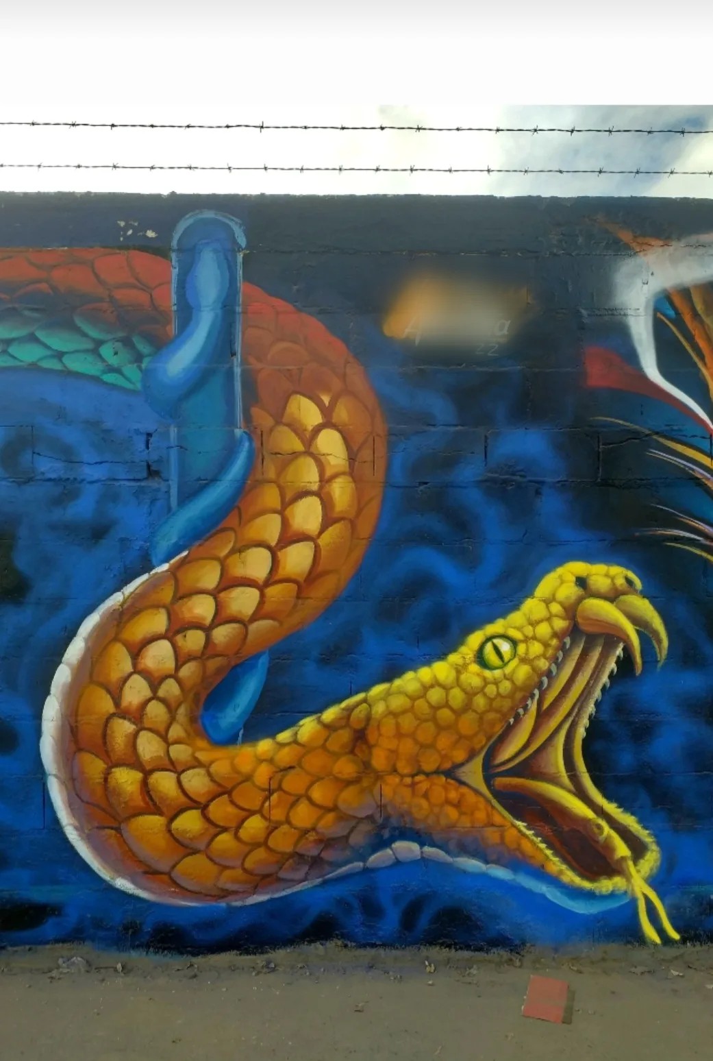 Fragmento mural serpiente