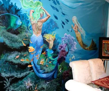 Underwater mural with mermaids and tropical fish