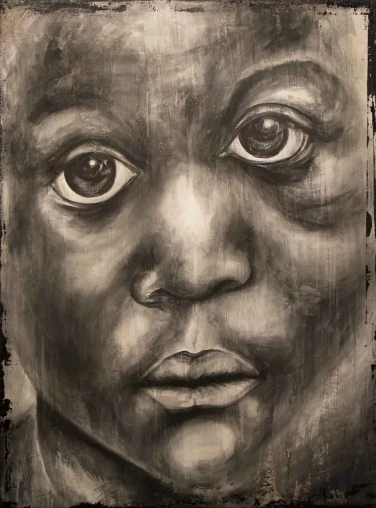 Portrait of a young boy with a contemplative expression, pai