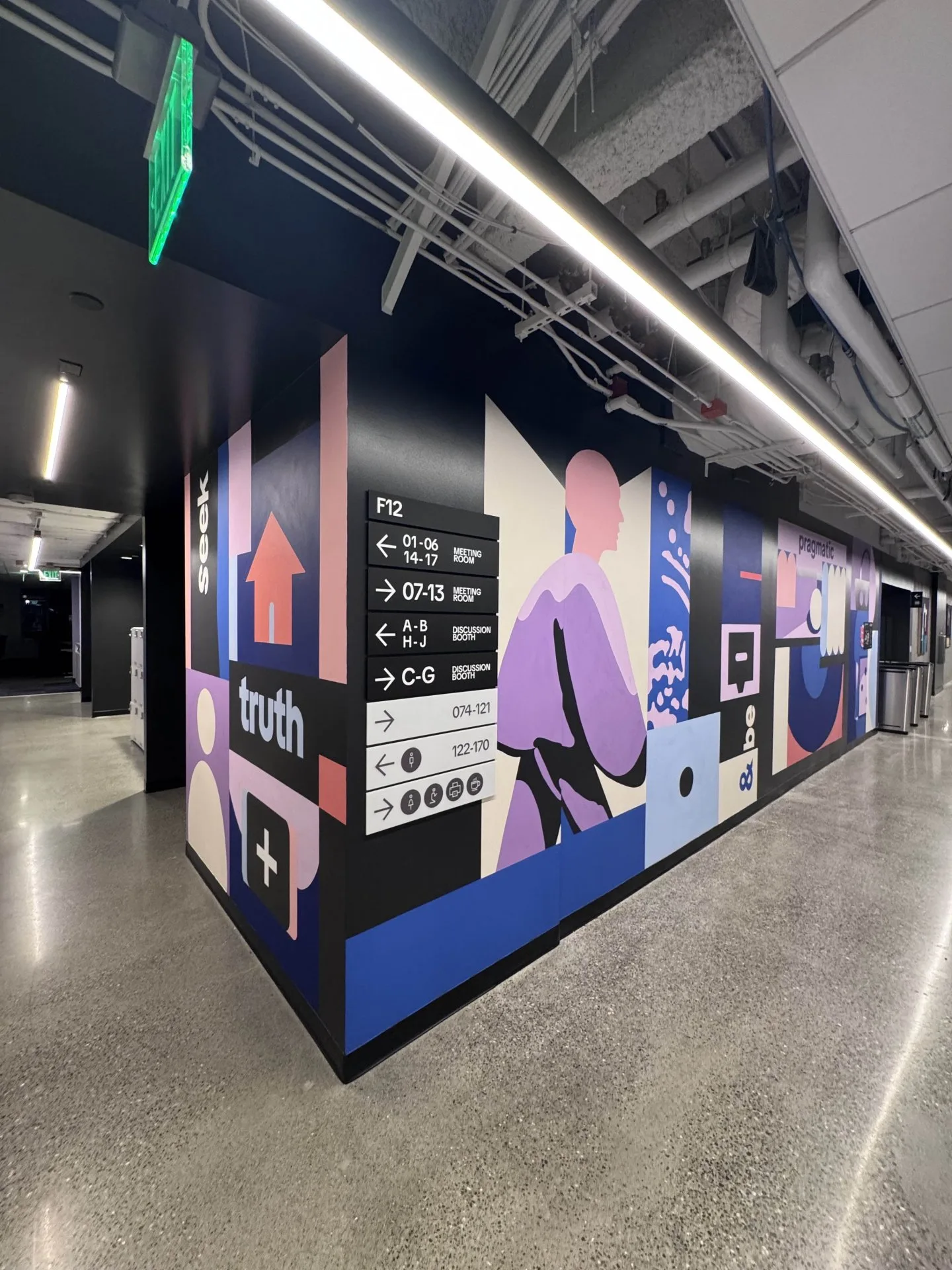 Corporate mural integrated during the construction phase in offices