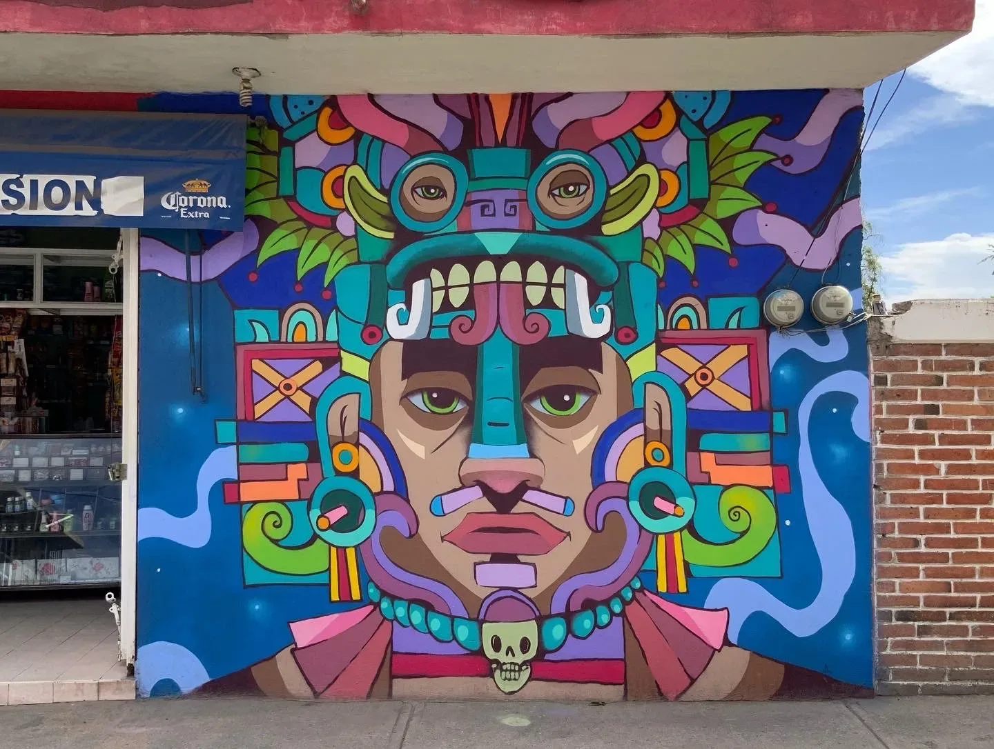 Large-scale abstract mural with geometric shapes and vibrant colors